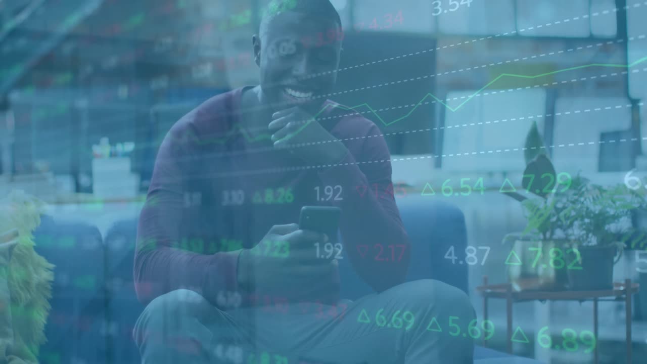 Animation of financial data processing over african american businessman using smartphone