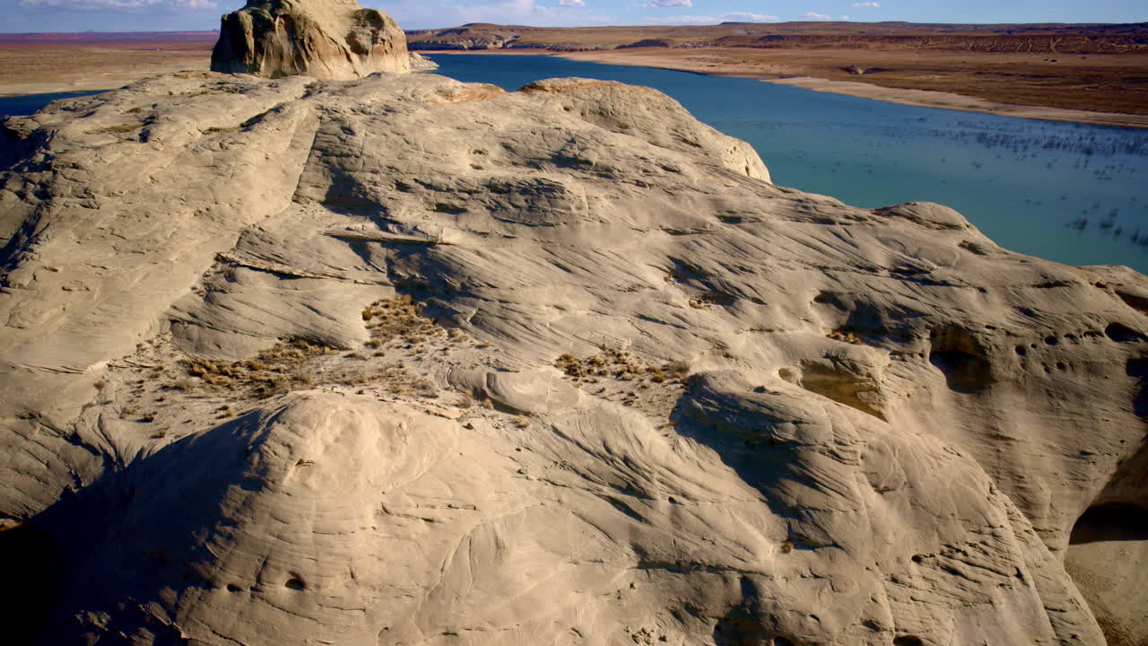 From high above, the drone surveys a surreal world of stone and shadow in the heart of the American desert.