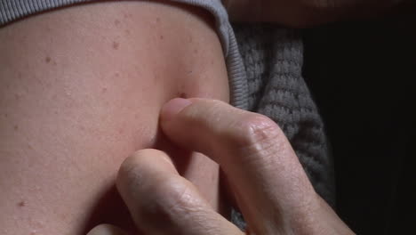 checking for a lump on the arm