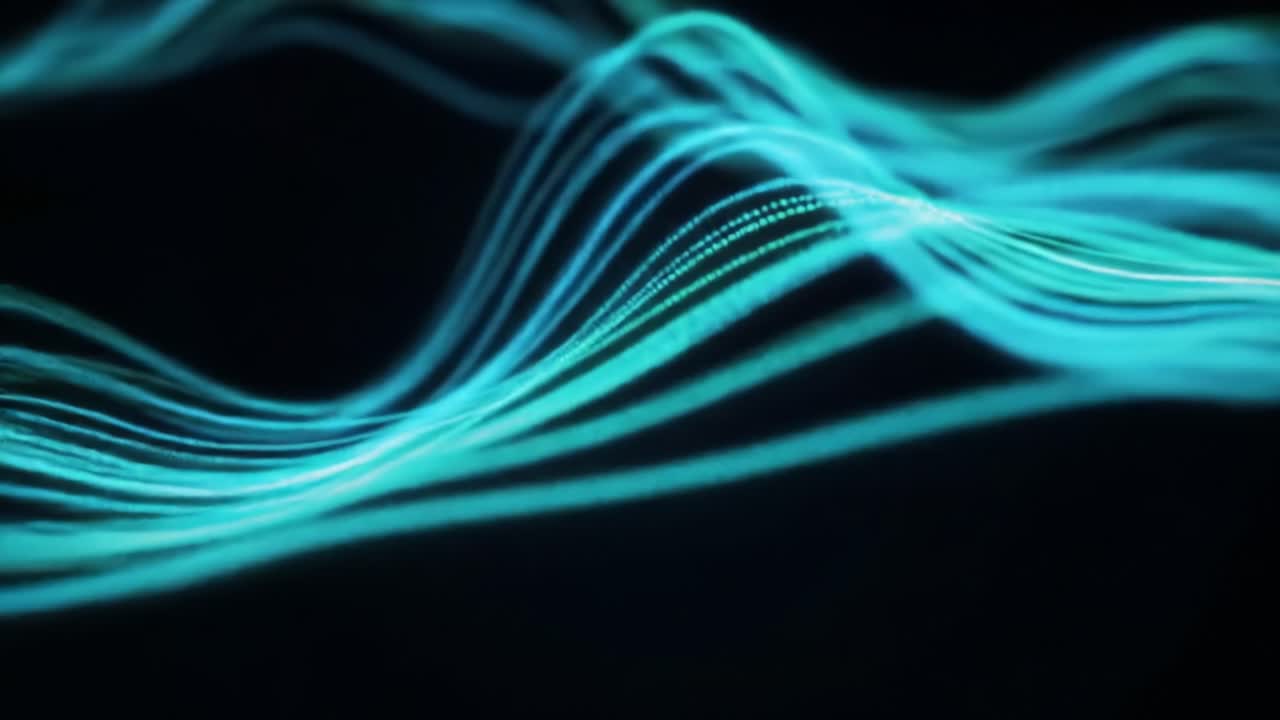 Bright, colorful light waves flow and intertwine in a captivating abstract display. The vibrant patterns create a mesmerizing atmosphere during nighttime, showcasing dynamic movement and energy.