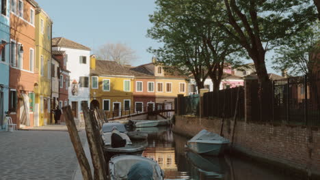 Street-with-canal-and-coloured-houses-in-Burano-island-Italy