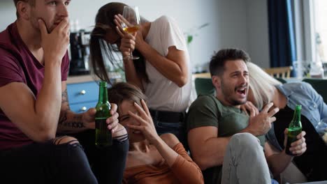 Group-of-friends-watching-scary-movie-together.