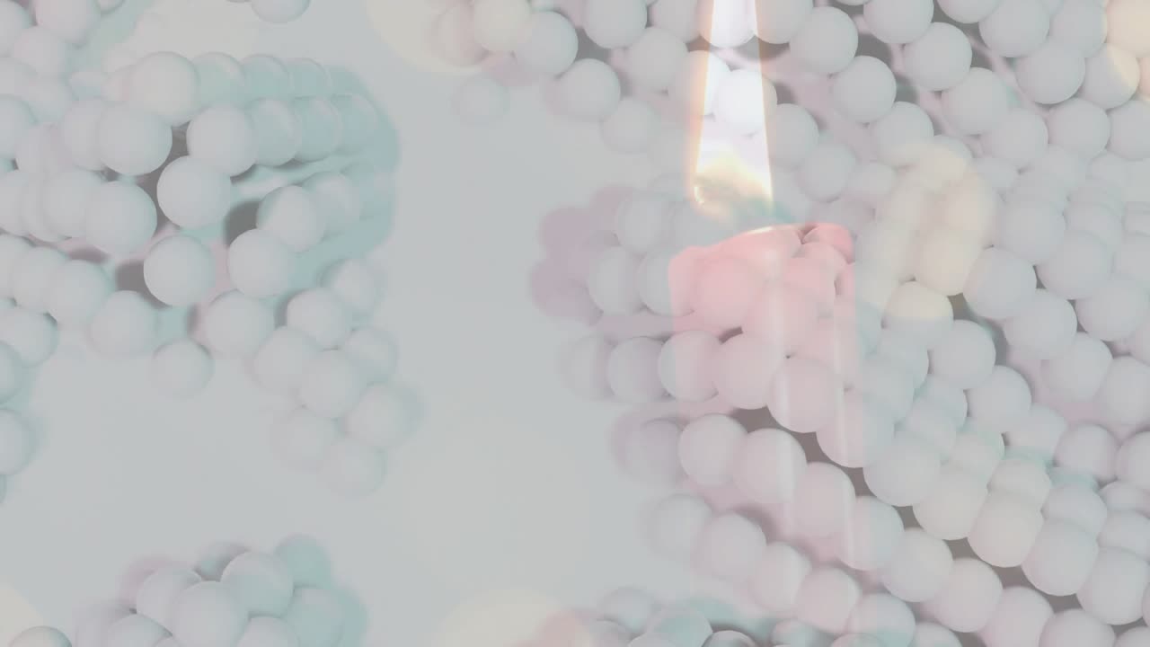 Soft bokeh lights drifting and pulsing then flame emerging above pink bead cluster lighting beads