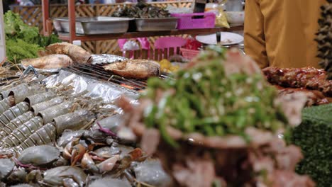 traditional thai food display on street food stall, night market bangkok