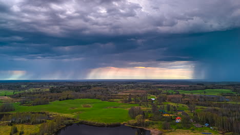 stormy clouds over countryside landscape - timelapse