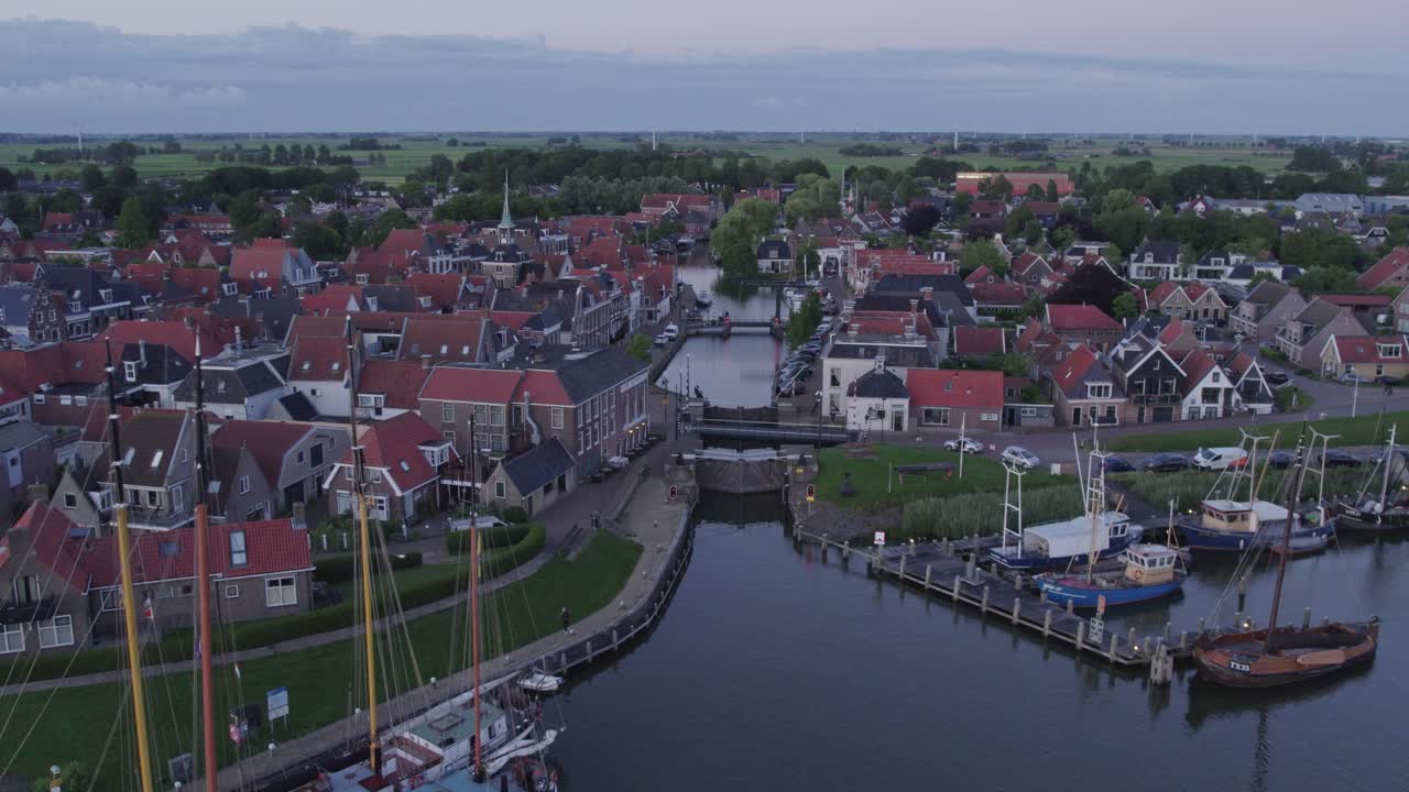 Drone shot of Makkum Friesland with the sluice gate and the center, aerial