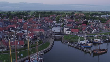 Drone-shot-of-Makkum-Friesland-with-the-sluice-gate-and-the-center,-aerial