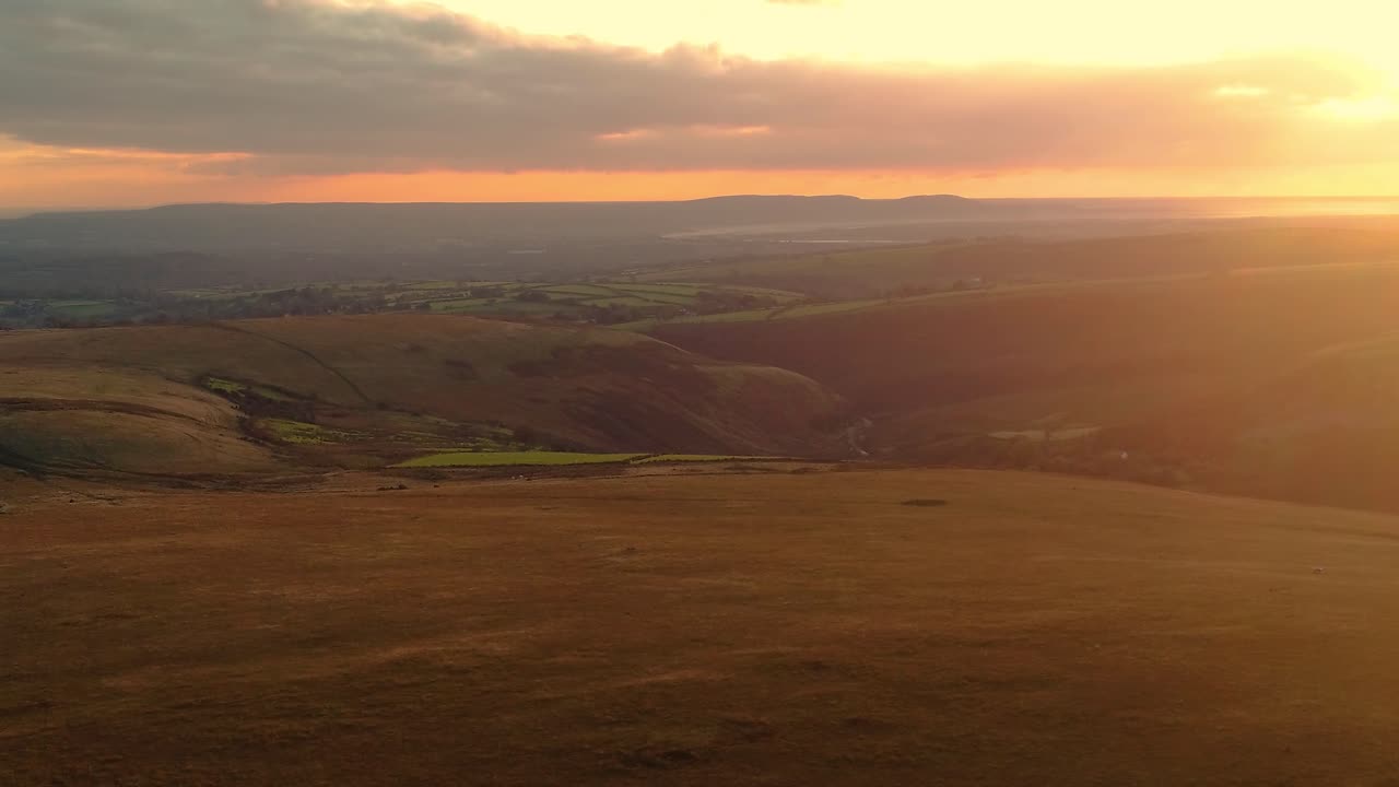 Stunning Sunset over Rolling Hills and Valley