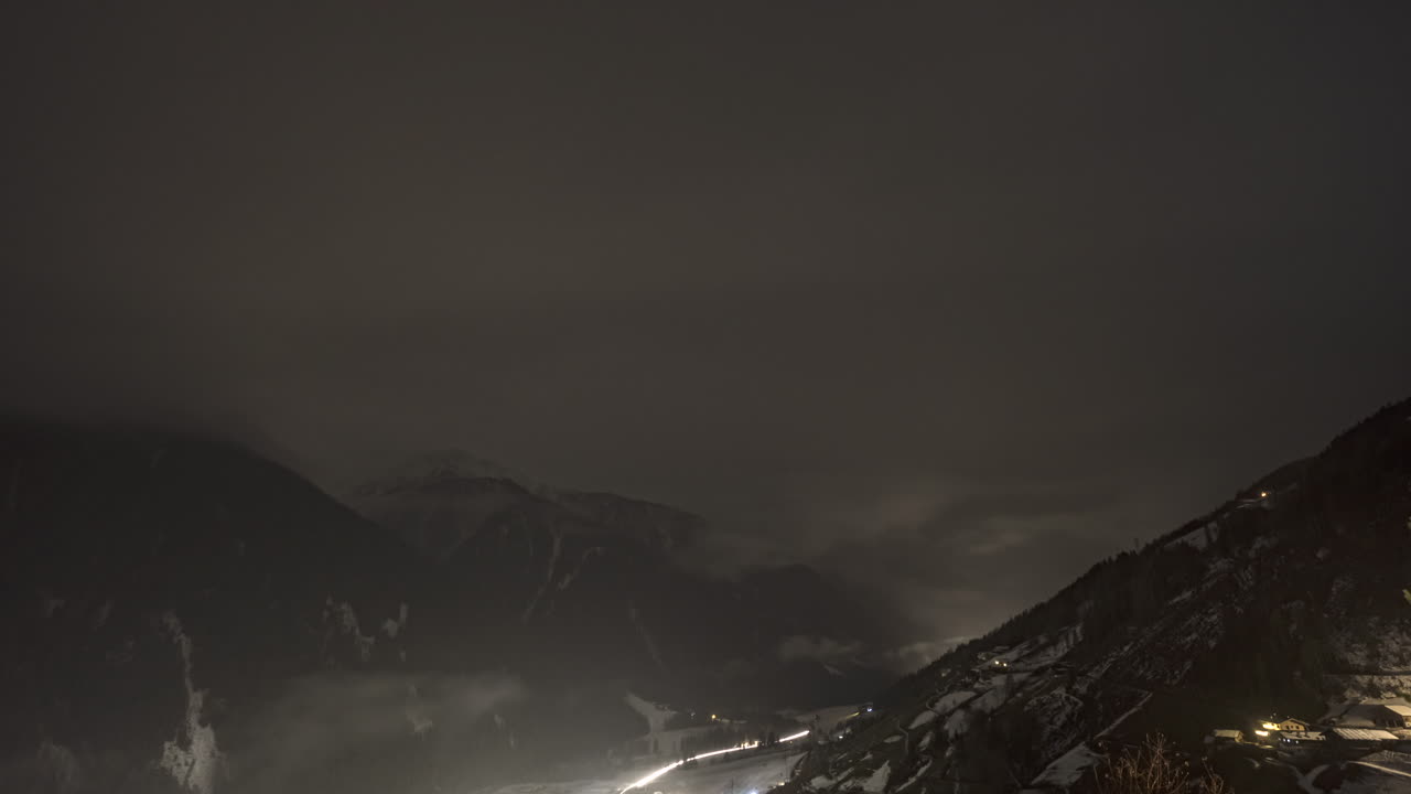 Time Lapse of Sankt Walburg in Ultental during a cloudy night with fog