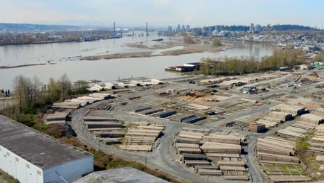 stocks of cut woods in a wood production industry on the bank of fraser river in new westminster, bc, canada