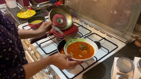 persian food culinary gastronomy cuisine gourmet cooking slow food stew qeymeh with steamed rice and fried potato chips in kitchen oven in iran tehran concept of urban life tehran city iran couple