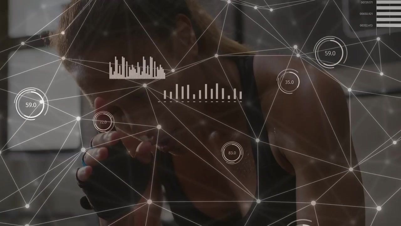 Woman performing plank in gym, gripping weight and driving AR HUD updates for biometric monitoring