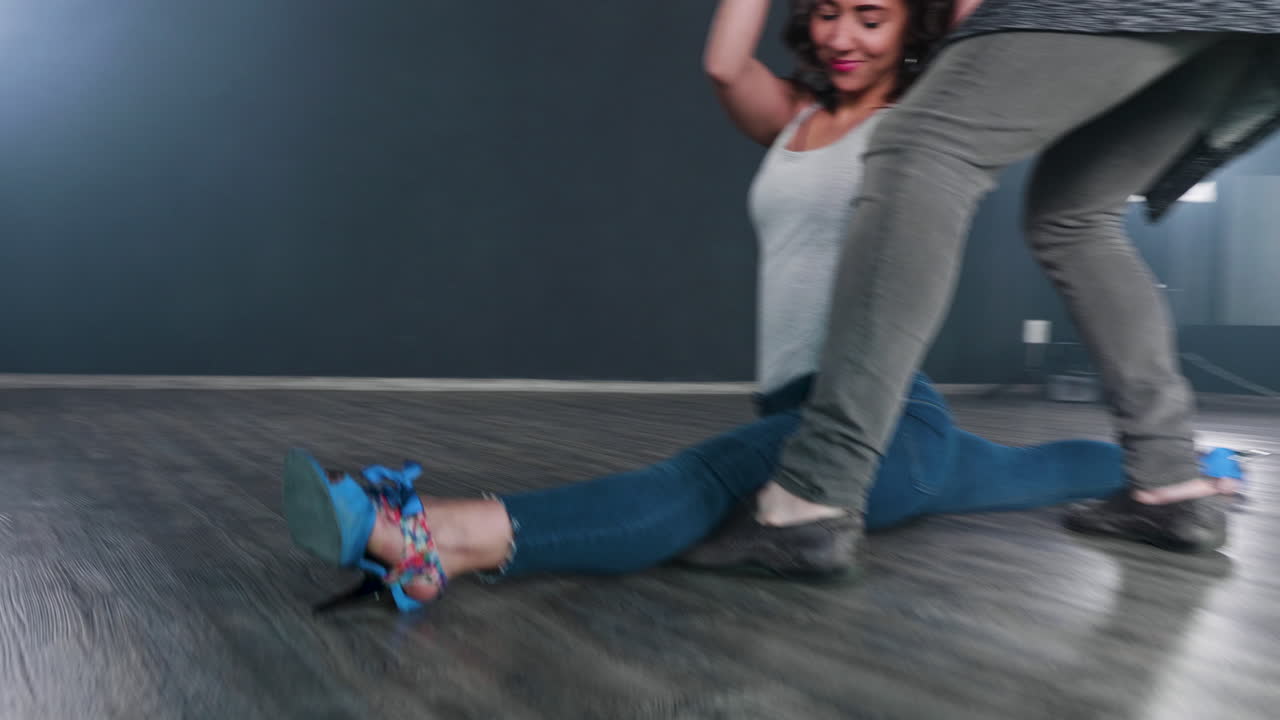 Dance lesson with instructor and student