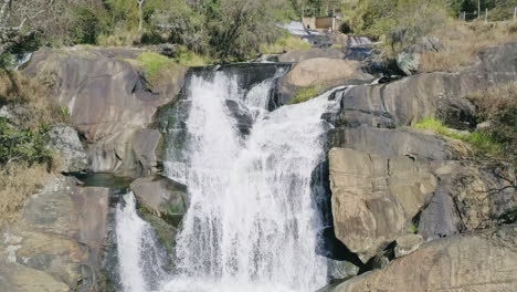 Aerial-shot-goes-from-waterfall-to-vast-landscape-in-an-area-of-Atlantic-Forest