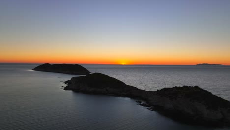 drone flight in small peninsula located in the sea of cortez of mexico at sunset