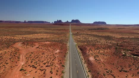 road between deserted land towards red rock state park in arizona, usa. - aerial