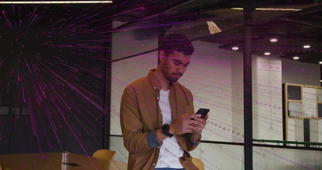 Young Man Using Smartphone in Modern Office with Digital Data Overlay