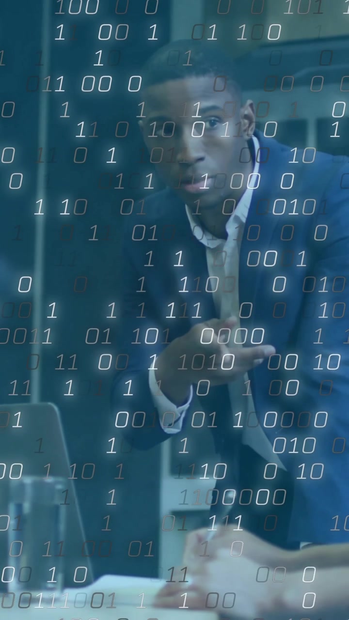 Discussing strategy, diverse professionals in business meeting with binary code overlay