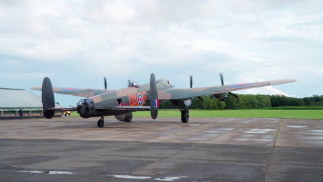 video of the famous second world war lincoln bomber airplane taxing along on a raf air-force base in lincolnshire uk