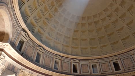 View-of-the-oculus-natural-light-in-Pantheon-dome-in-Rome,-ancient-Rome-temple