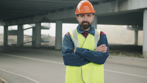 construction worker under an overpass