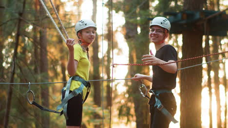 people with helmets and harness