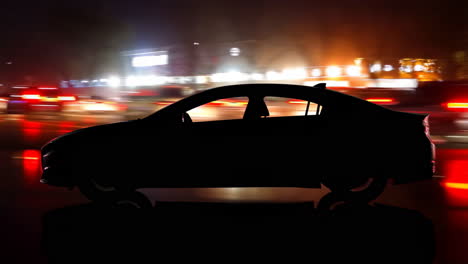 silhouette of a car at night