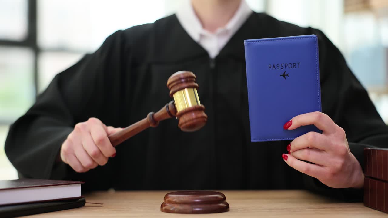 Judge or Lawyer Holding Gavel and Passport