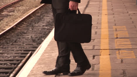 man waiting for train