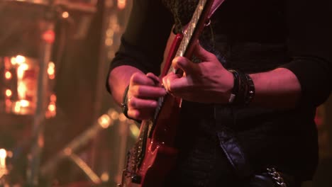 guitarist performing live on stage