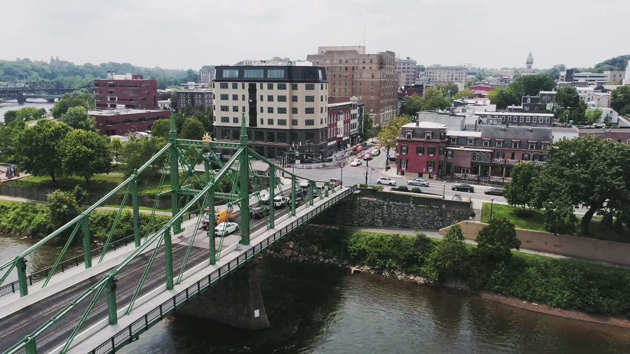 Aerial view of Easton PA and Delaware River with bridge leading into the city