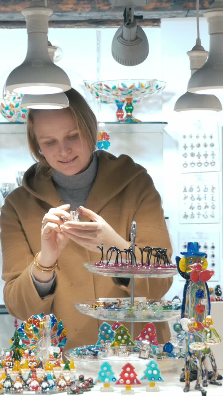 Woman Shopping for Glass Art Jewelry