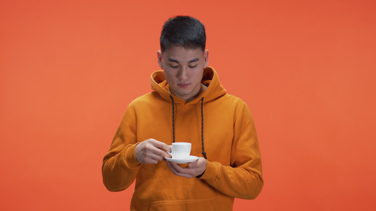 Man Drinking Espresso