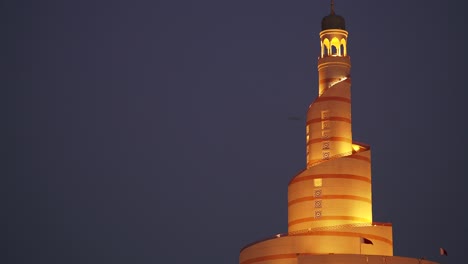 spiral minaret of the mosque at night