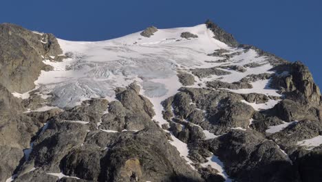 snowy joffre peak, rocky mountain on a sunny day in bc, canada