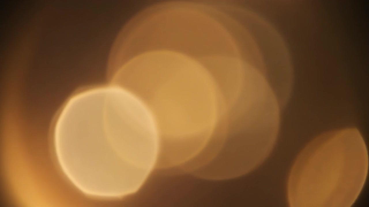 Abstract La luce dorata Bokeh sullo sfondo