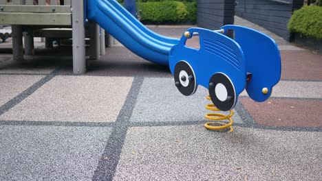 blue car spring rider on playground