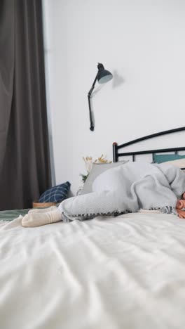 child playing and sleeping in a bedroom