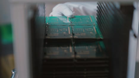 slow motion of computer chips stacked closely in a factory setting