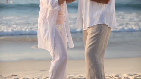 elderly man dancing with his wife