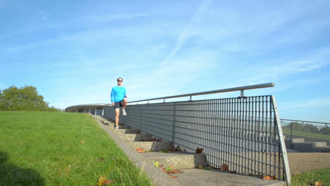 Runner-man-running-outdoors-in-park