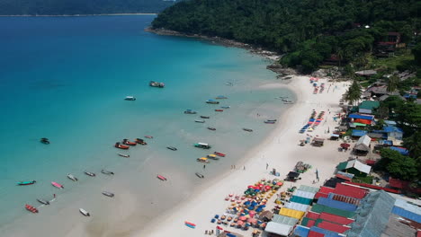 paradise beach turquoise water perhentian island malaysia costal rocks drone