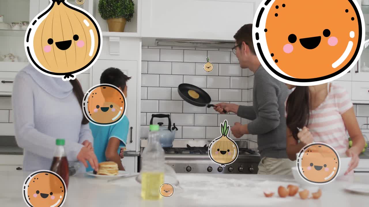 Animation of onions and oranges over happy asian family making pancakes in kitchen