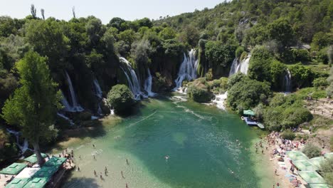 kravica falls cascading down on sunny day