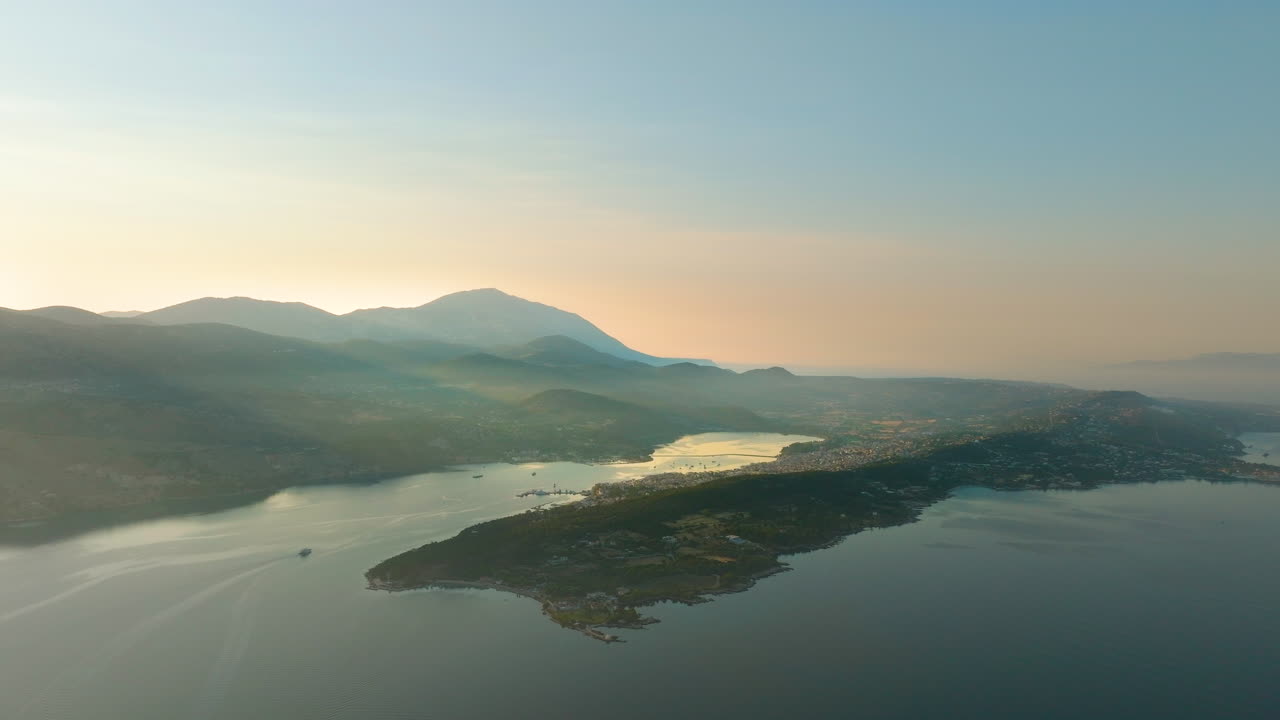 Aerial View of Coastal Landscape with Mountains and Islands at Sunrise/Sunset