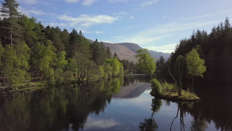 Aerial-view-of-Glencoe-Lochan-on-a-sunny-day,-Glencoe,-Scottish-Highlands,-Scotland