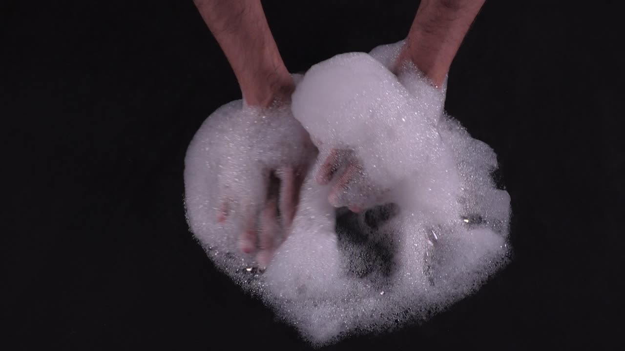 Foam making by hand, a close-up view