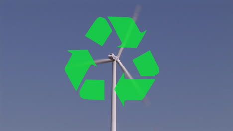 cartel de reciclaje y turbina eólica