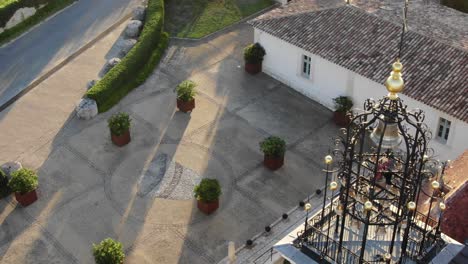 Details-of-bell-tower-and-courtyard-in-Chateau-Angelus-winery-at-Saint-Emilion-in-France