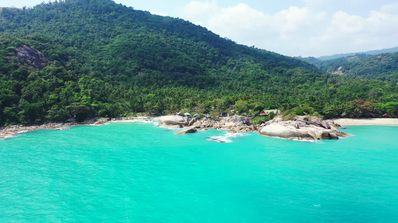 Calm lagoon, Ao than sadet bay with sandy beach, turquoise sea water and exotic trees. Aerial panorama
